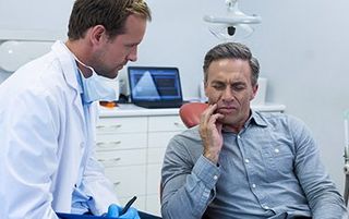 Preventative Dentistry — Man With Toothache in Kalamazoo, MI