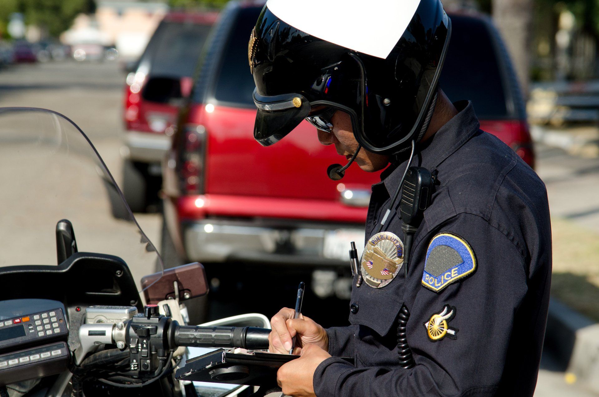 A Motorcycle Police Officer On A Car Stop — Chicago, IL — Clover Insurance Agency