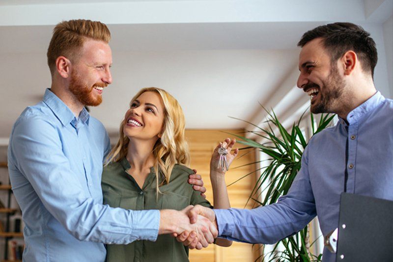 Couple Renting Apartment From Agent — Chicago, IL — Clover Insurance Agency