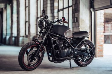 Modern Black Motorcycle In Garage — Chicago, IL — Clover Insurance Agency