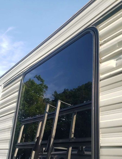 A large window on the side of a trailer