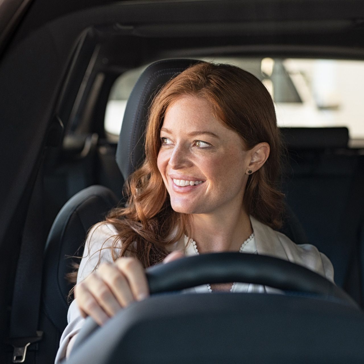 Businesswoman Driving Her Car — Morton Grove, IL — The Insurance Pros