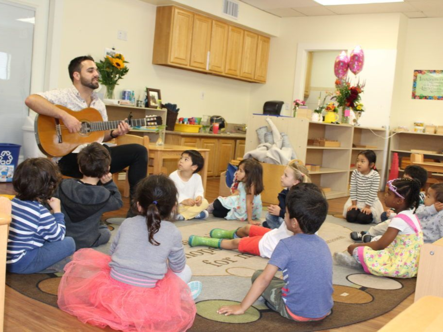 Montessori music lesson acoustic guitar circle time
