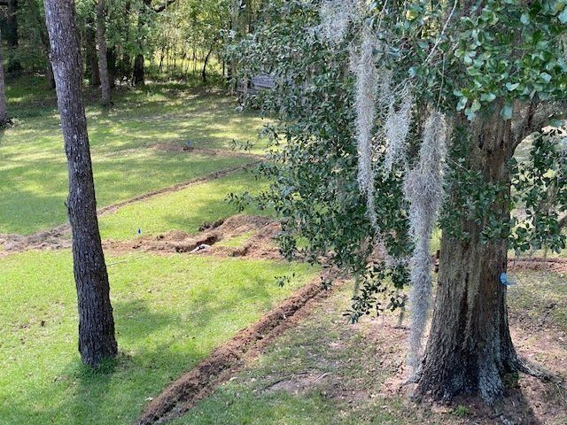 Digged Soil For Sprinkler System Pipes — Montgomery, AL — Lawns by Scott