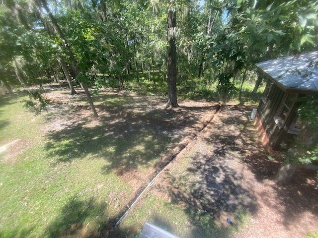 House In The Forest — Montgomery, AL — Lawns by Scott