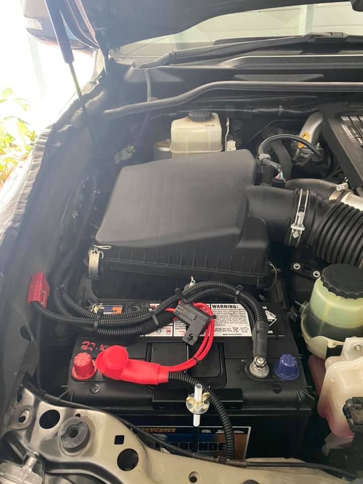 A Close Up of the Engine of a Car With the Hood Open — Activate Auto Electrics & Air Conditioning In Caloundra, QLD