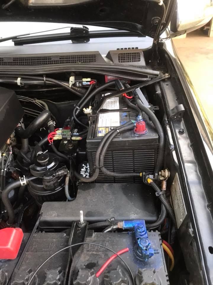 A Close Up of the Engine of a Car With the Hood Open — Activate Auto Electrics & Air Conditioning In Caloundra, QLD