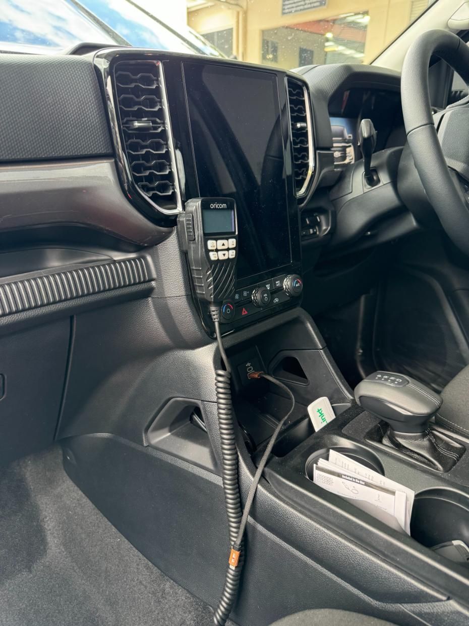 The Inside of a Car With a Microphone Attached to the Aircon— Activate Auto Electrics & Air Conditioning In Caloundra, QLD