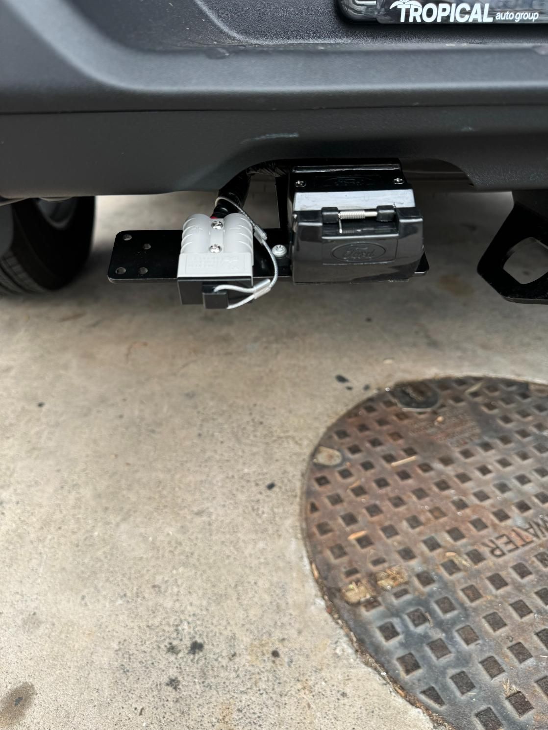 A Black Car With a Tropical License Plate — Activate Auto Electrics & Air Conditioning In Caloundra, QLD