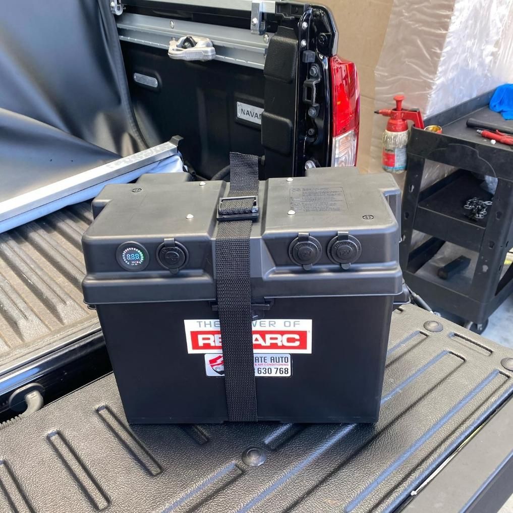A Black Battery Box is Sitting on the Back of a Truck — Activate Auto Electrics & Air Conditioning In Caloundra, QLD