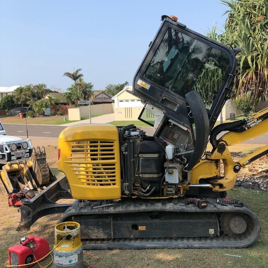 A Yellow Excavator With Its Doors Open — Activate Auto Electrics & Air Conditioning In Caloundra, QLD