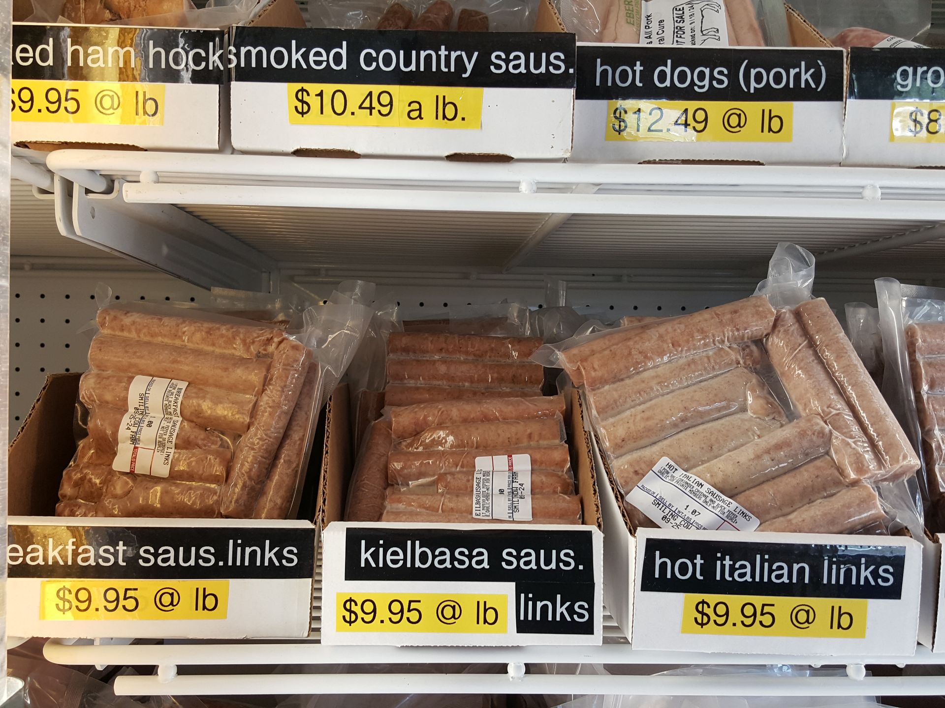A shelf of sausages