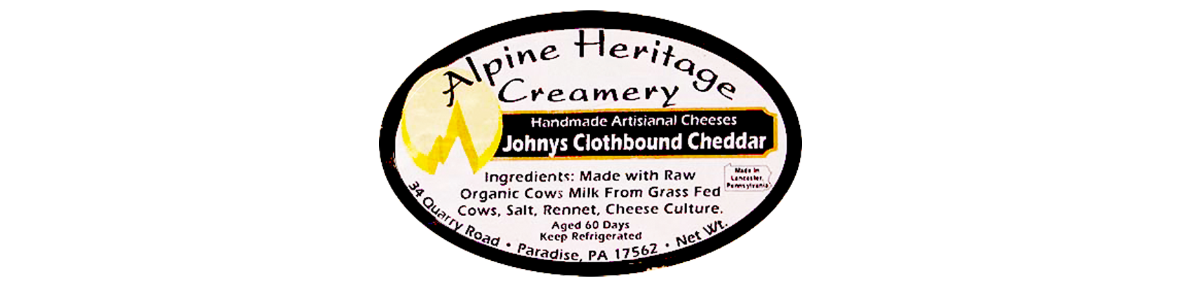 A close up of a label for alpine heritage creamery