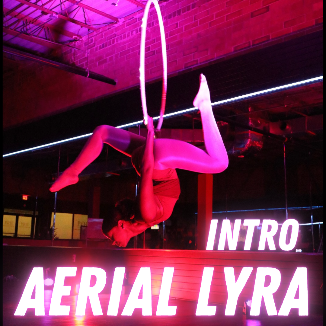 A woman is doing aerial lyra on a hoop
