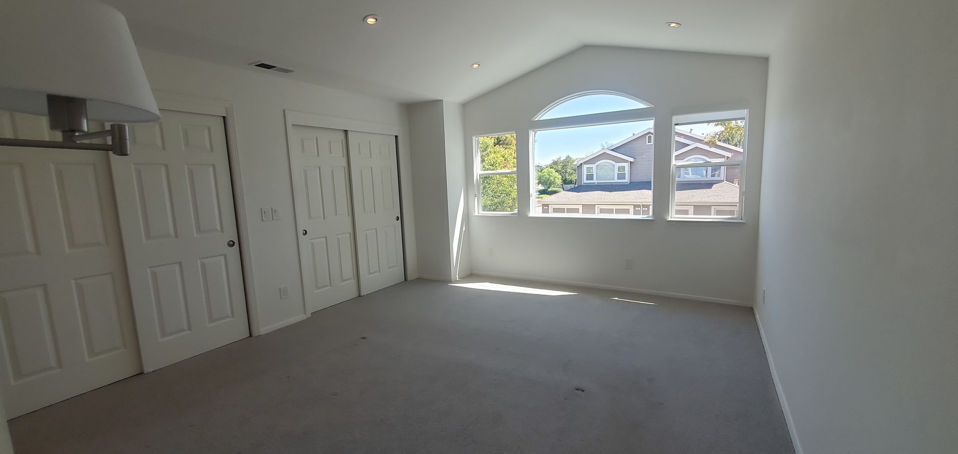 There is a large window in the middle of the room.