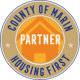 The logo for the county of marin is a housing first partner