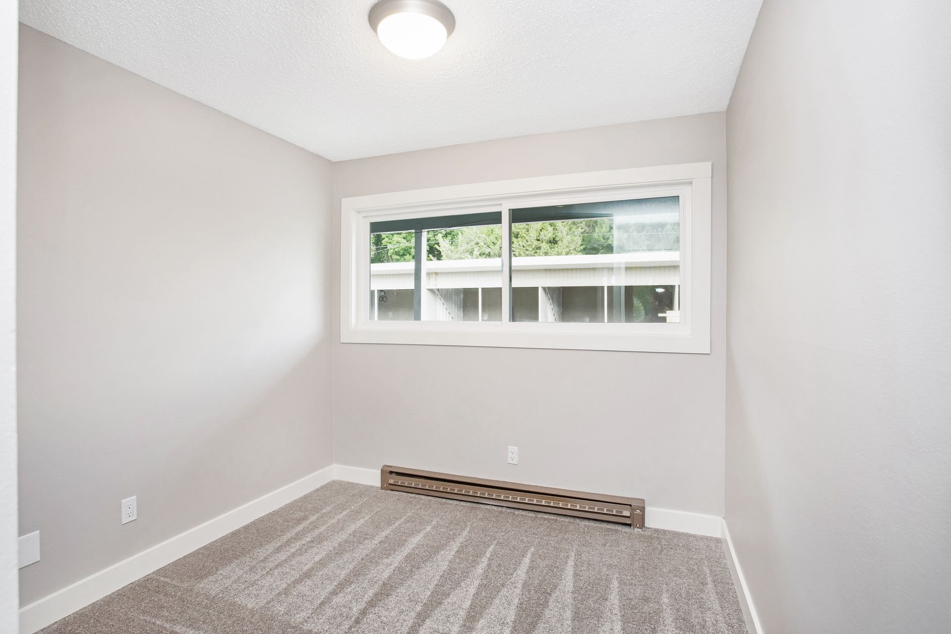 There is a large window in the middle of the room.