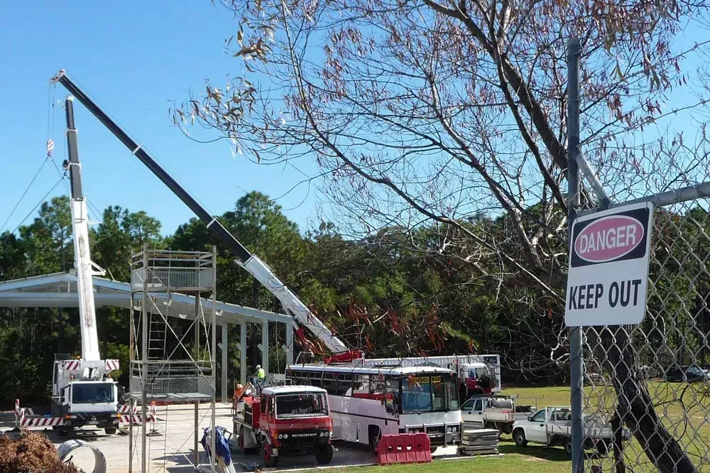 A Construction Site with A Danger Keep out Sign — AMAC Cranes in Coolum Beach, QLD