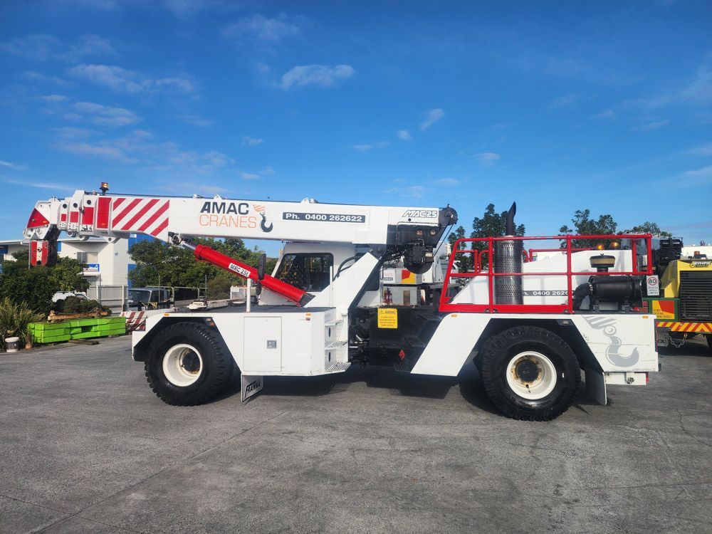 White Crane Hire Truck in A Construction Site