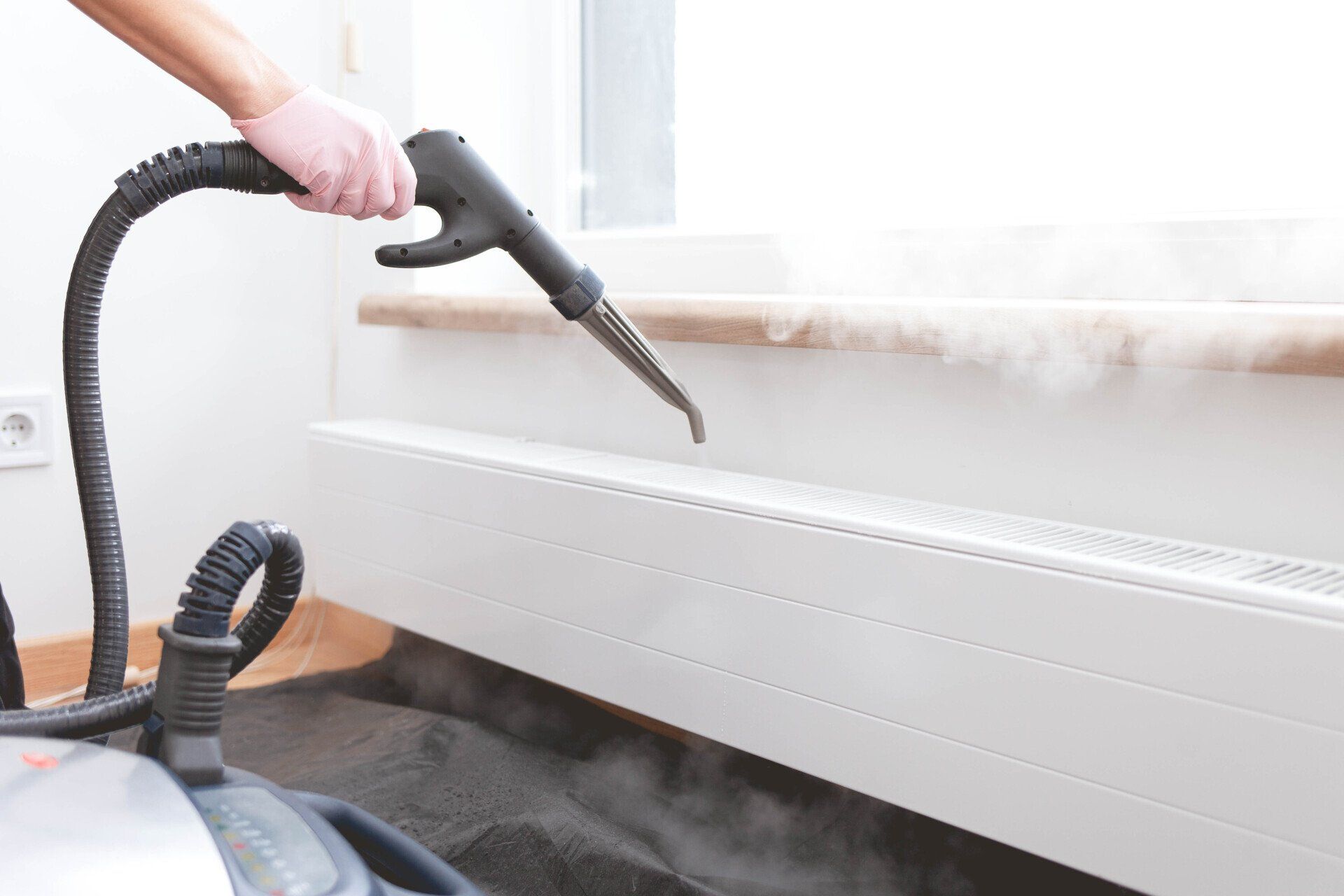 Cleaner using equipment to deep clean home