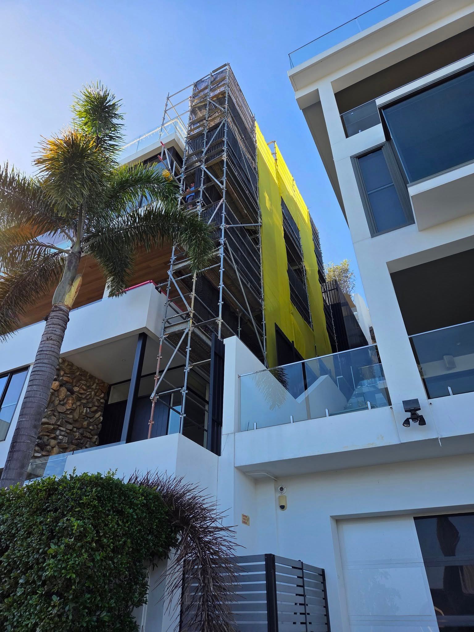 House Exterior With Scaffolding and Ladder for Renovation — Top Tier Scaffolding in Underwood, QLD