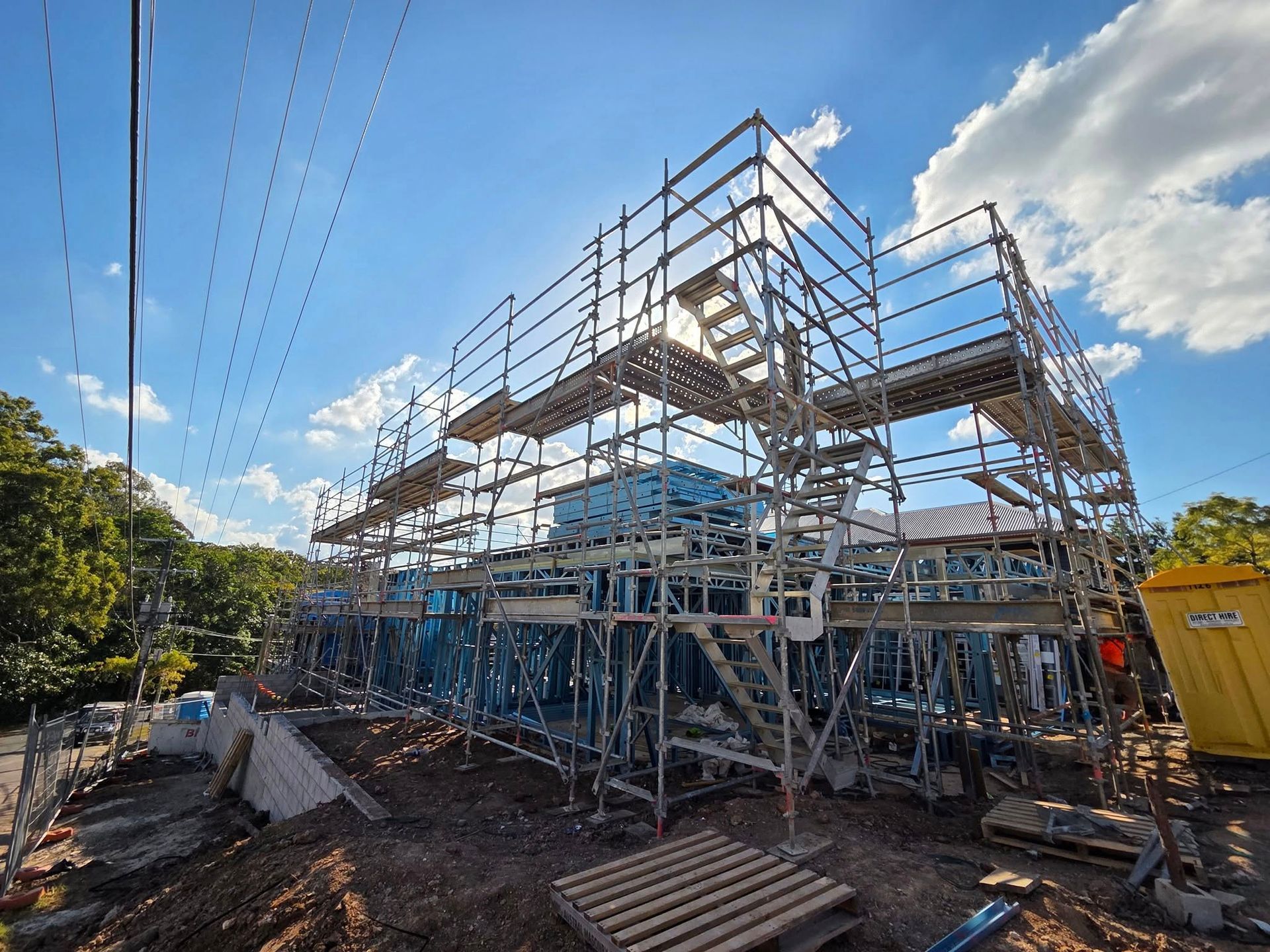 Construction of a Brick Building — Top Tier Scaffolding In Gold Coast, QLD
