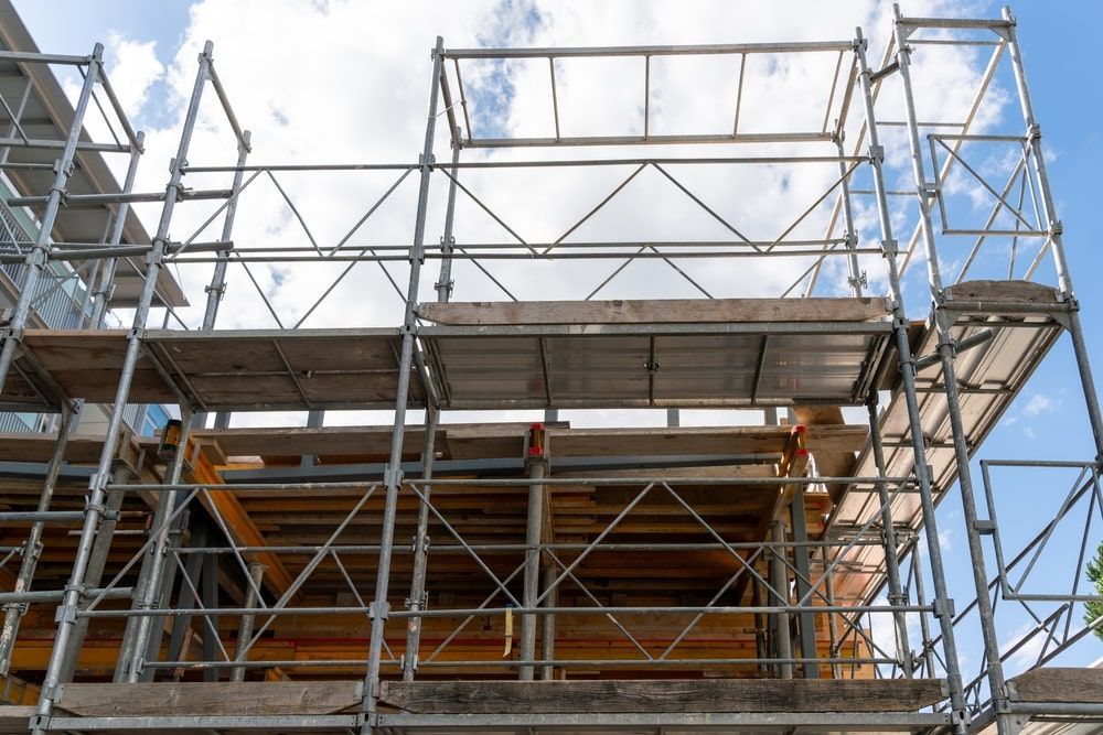 Scaffolding on building exterior — Top Tier Scaffolding In Gold Coast, QLD