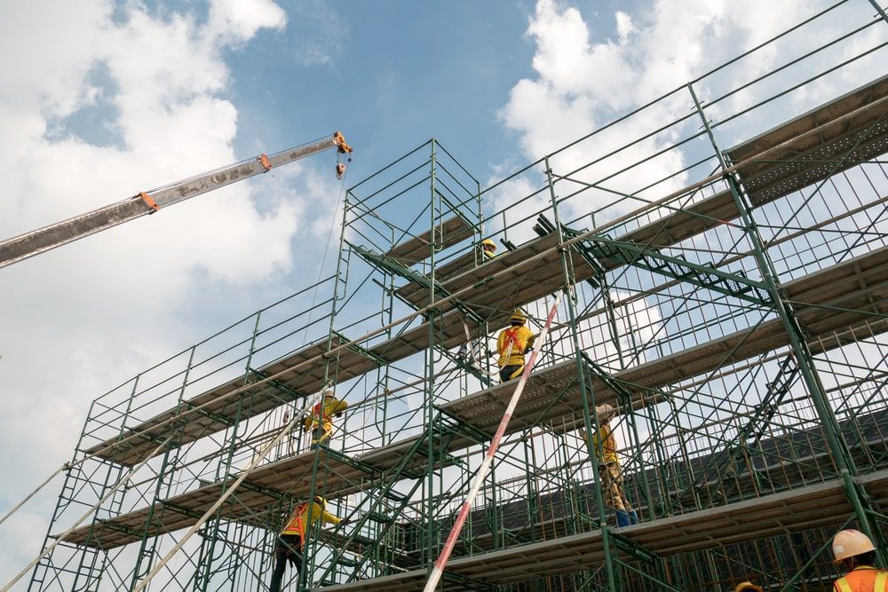 Construction workers on scaffolding — Top Tier Scaffolding in Underwood, QLD