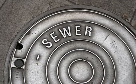 High — Clean Man Hole with Sewer Word in Meridian, MS