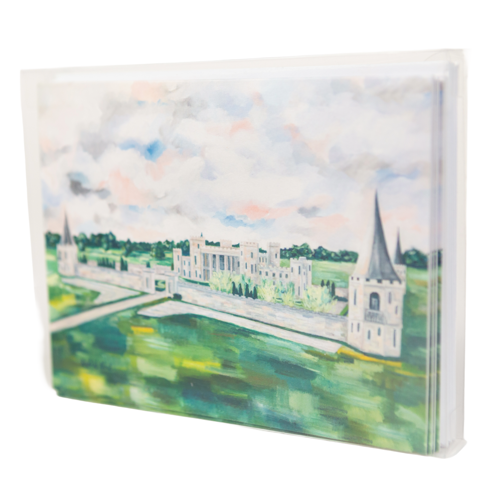 Two canvas prints depicting a light-colored castle with tall spires, set in a green field under a cloudy sky.