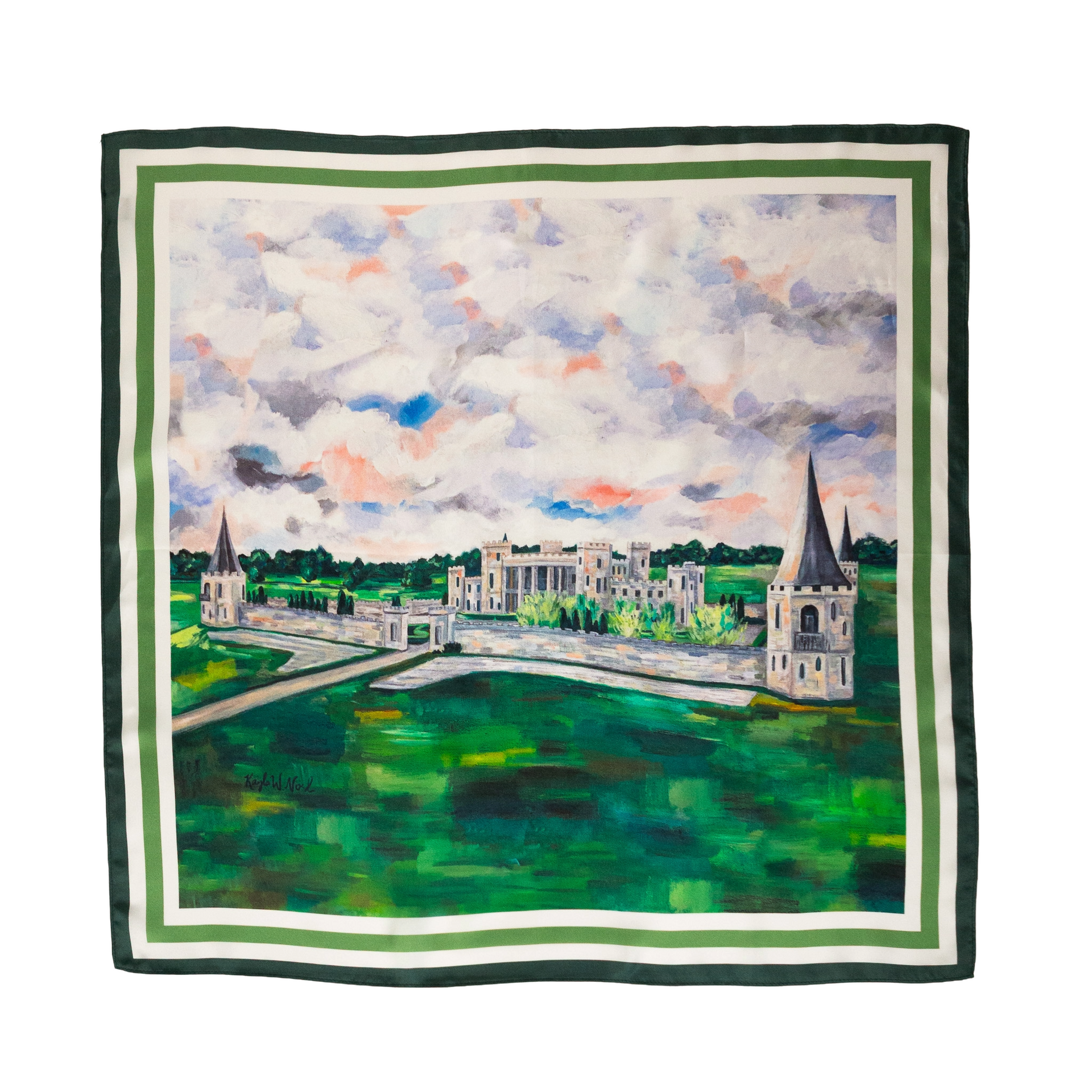 Silk scarf with a watercolor painting of a building with towers in a green field under a cloudy sky.