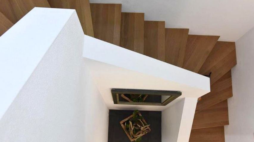 Der Aufgang in das Obergeschoss des Ferienhaus Tegernsee Chalet