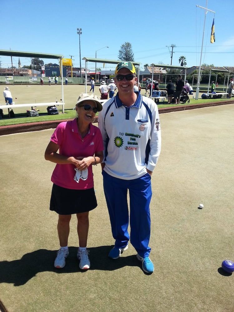 Woman and Man Smiling on a Lawn Bowls Green — Inverell Sporties in Inverell, NSW