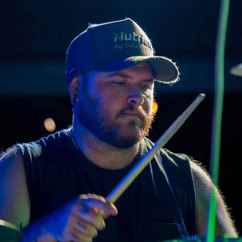 A Man Wearing A Hat That Says Nuts On It — Inverell Sporties in Inverell, NSW