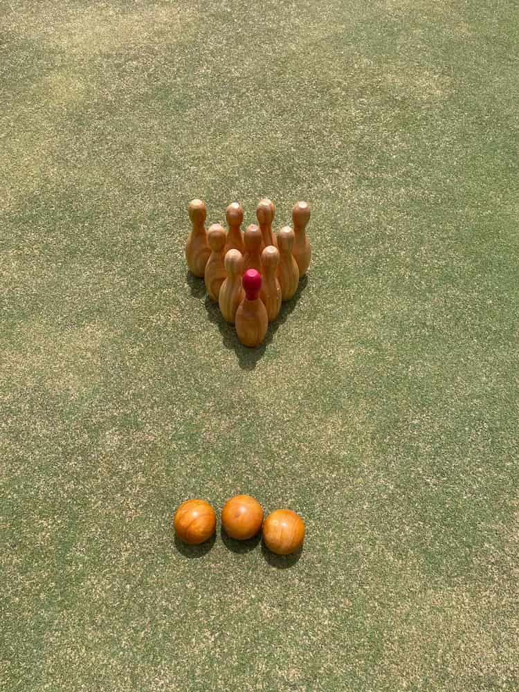 A Bowling Set Is Sitting On Top Of A Lush Green Field — Inverell Sporties in Inverell, NSW