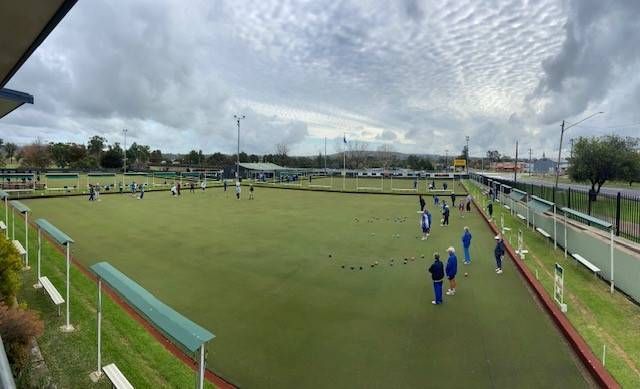 Lawn Bowls Green With Players in Blue and White Attire — Inverell Sporties in Inverell, NSW