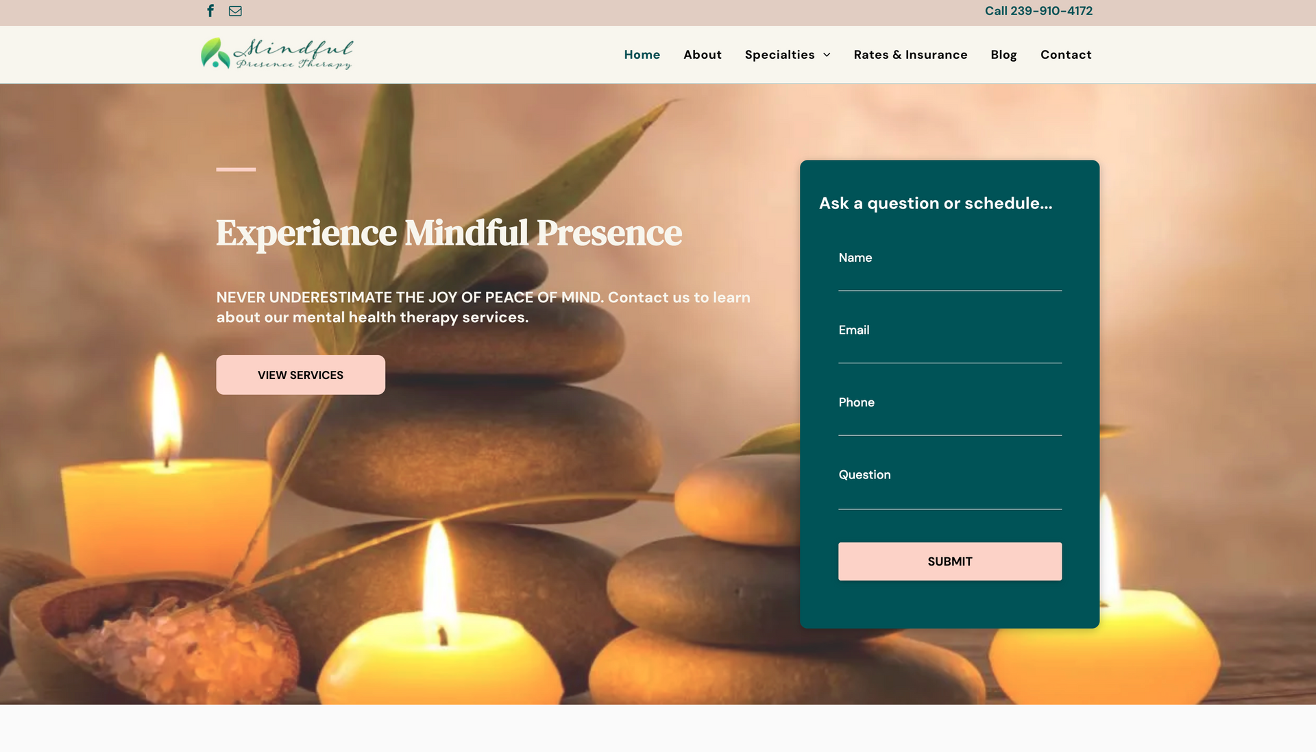 A website with a stack of rocks and candles on it.