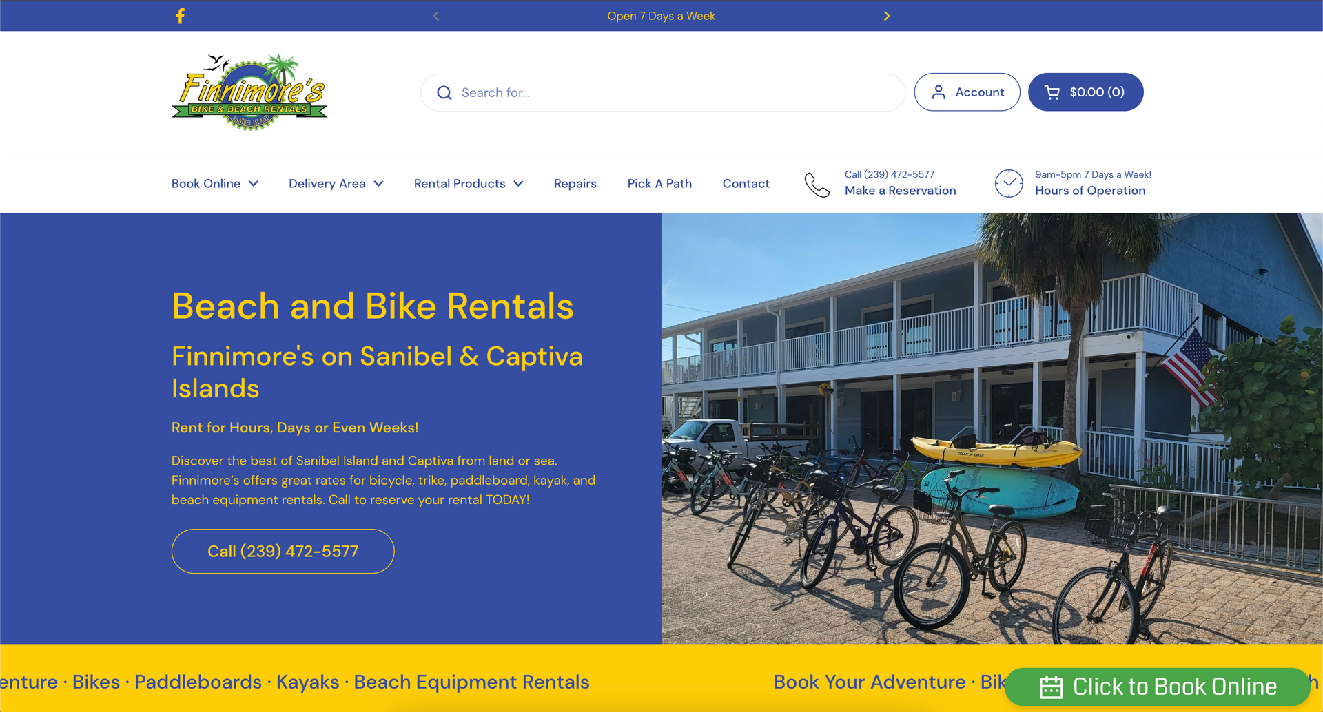 A row of bikes are parked in front of a building.