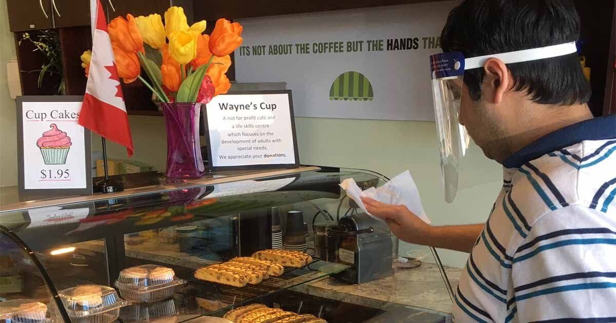Student cleaning in Wayne's Cup Café