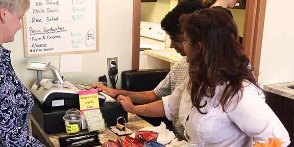 Volunteer helping out in Wayne's Cup Café