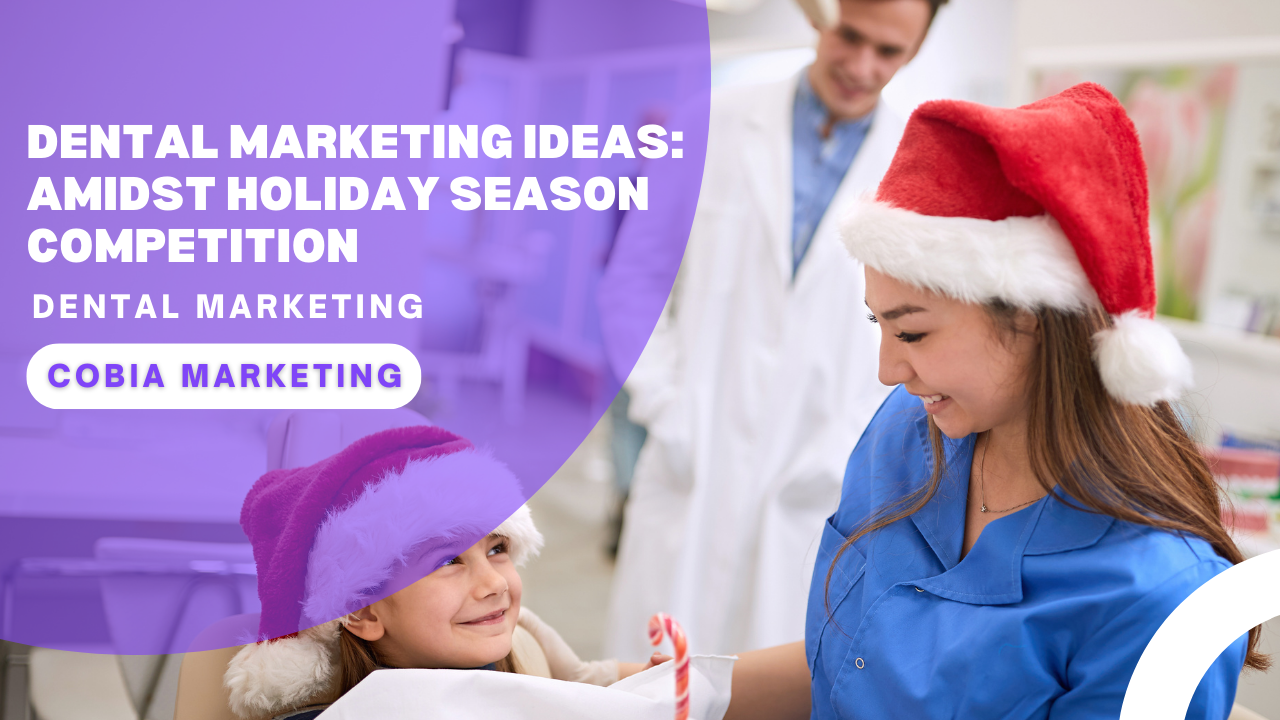 A woman in a santa hat is giving a child a toothbrush.