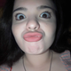 A close up of a woman making a funny face