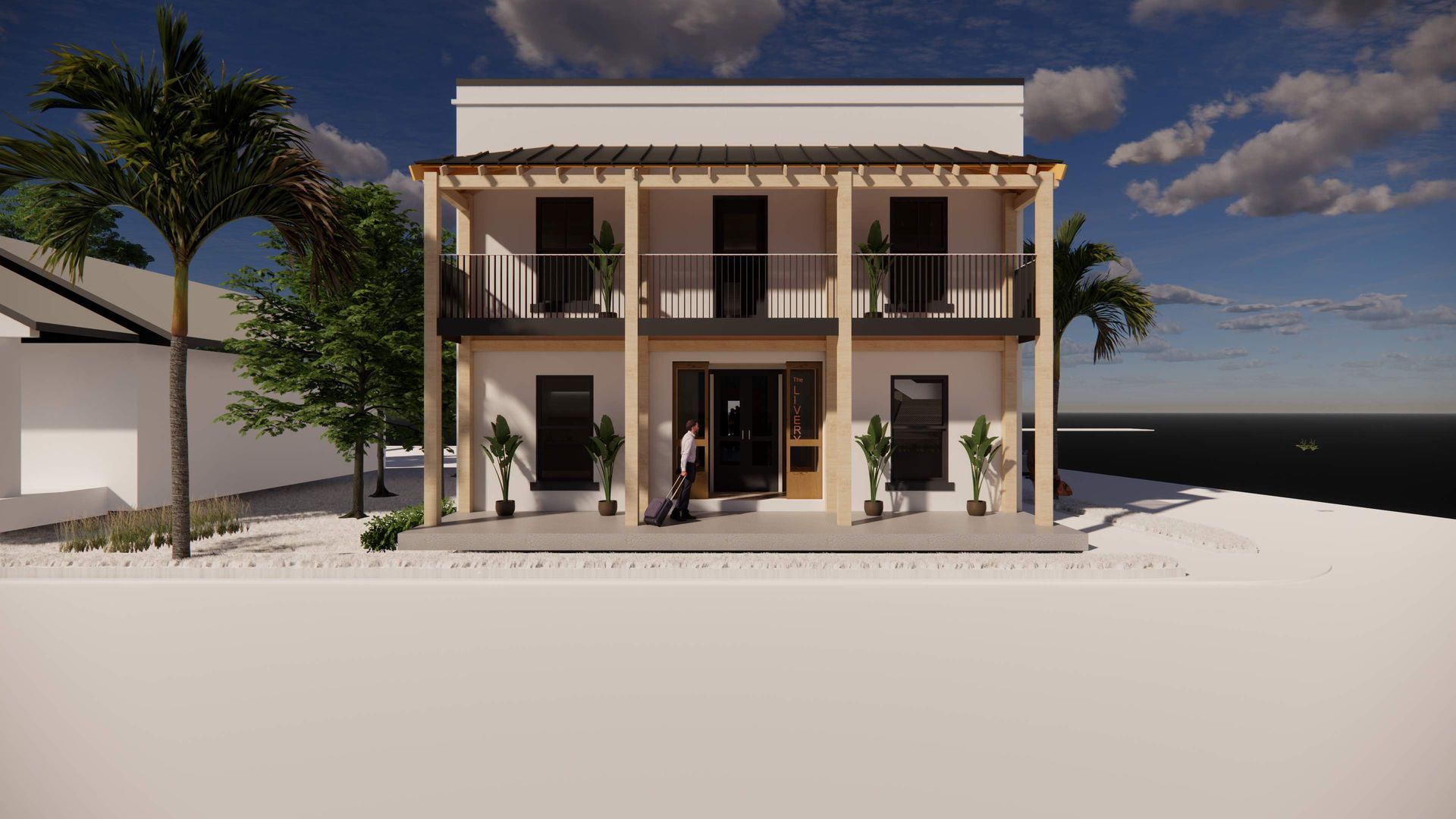 Two-story white building with a porch and balcony, palm trees, and ocean view.