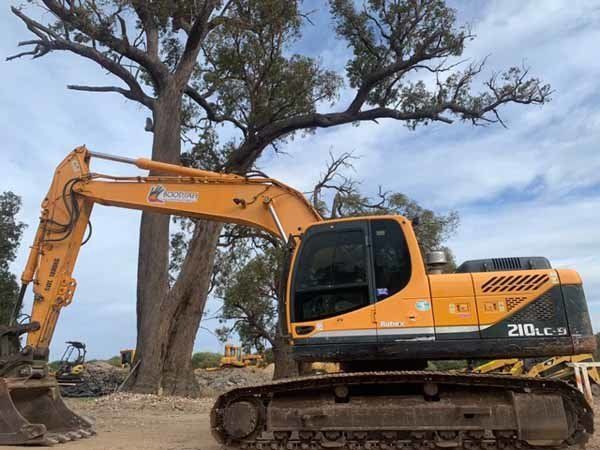 yellow extended tractor