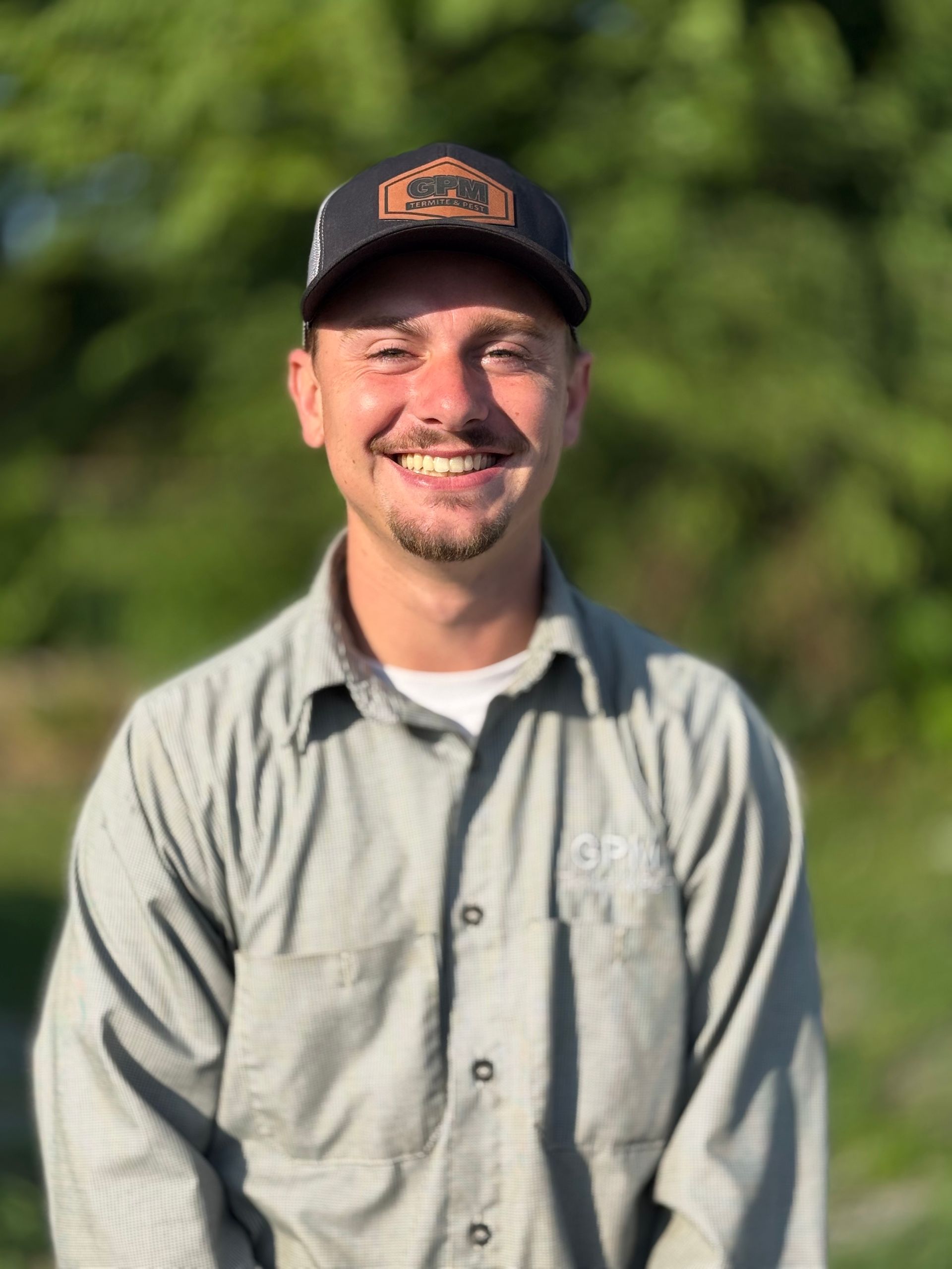 A stick figure of an ant is holding a piece of paper.