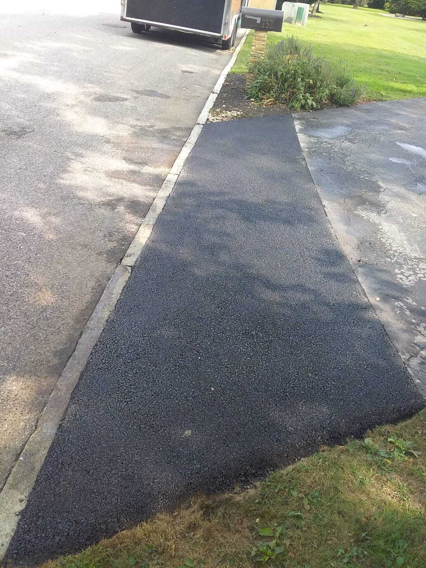 after driveway patching image one