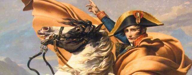 Napoleon Bonaparte in a bicorne hat and cape riding a rearing white horse, pointing upward against a mountainous backdrop.