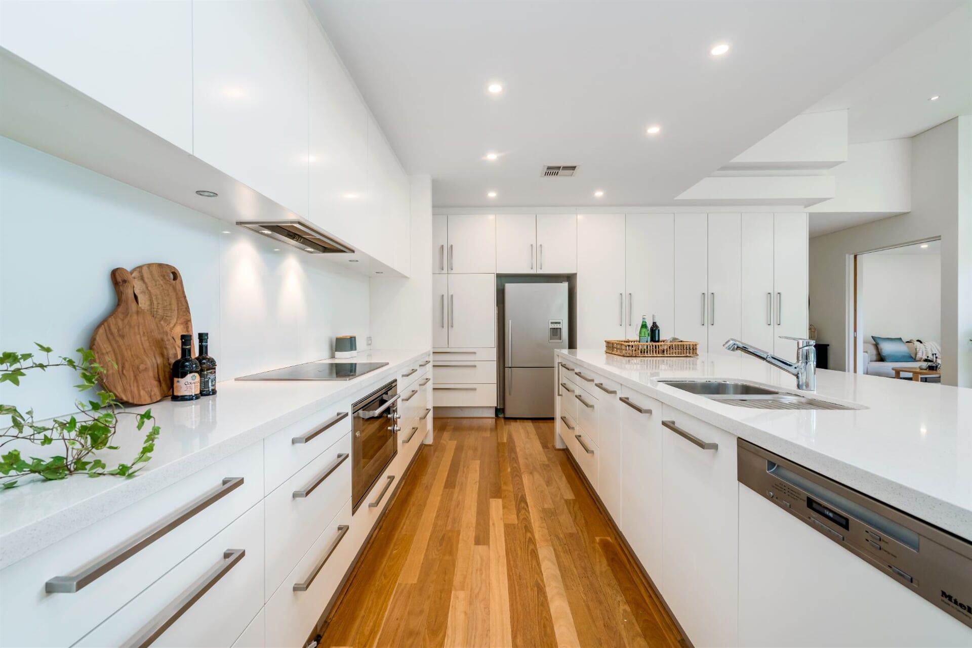 Clean White Theme Kitchen — West Stone Benchtops in Orange, NSW