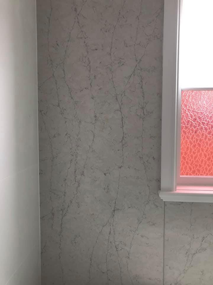 Feature Wall in Bathroom - Stone — West Stone Benchtops in Orange, NSW