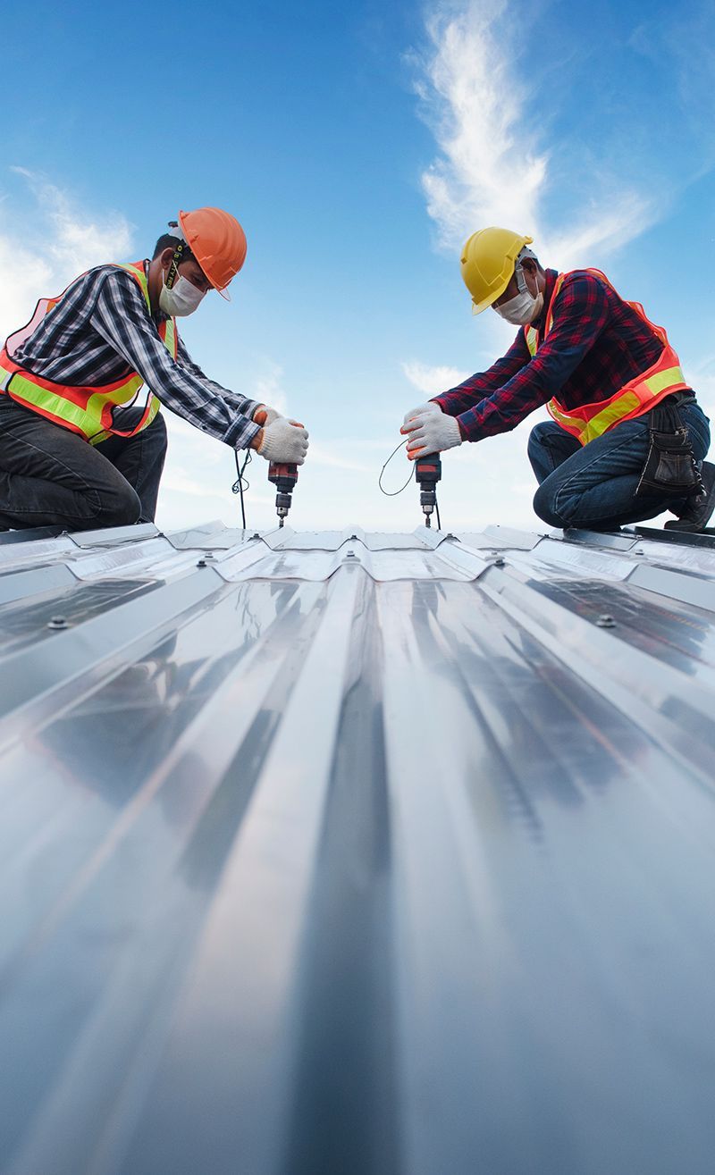 Workers Installing Metal Roof